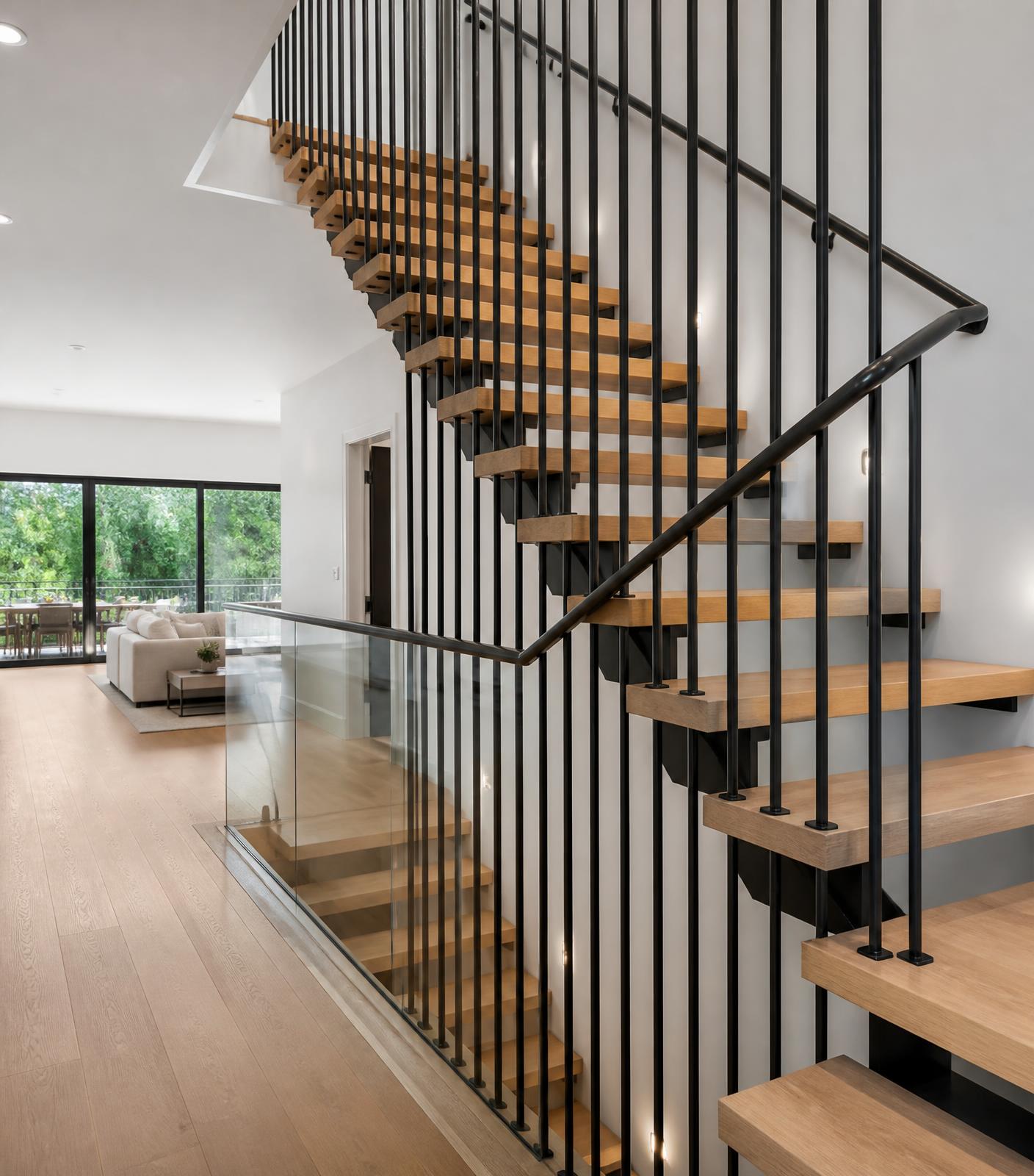 Modern black aluminum stair railing in a luxury New Jersey home